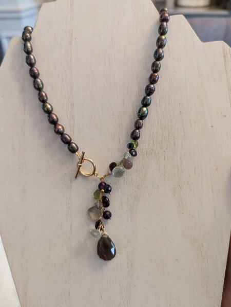 Peacock pearl necklace with a multi-gemstone tassel drop