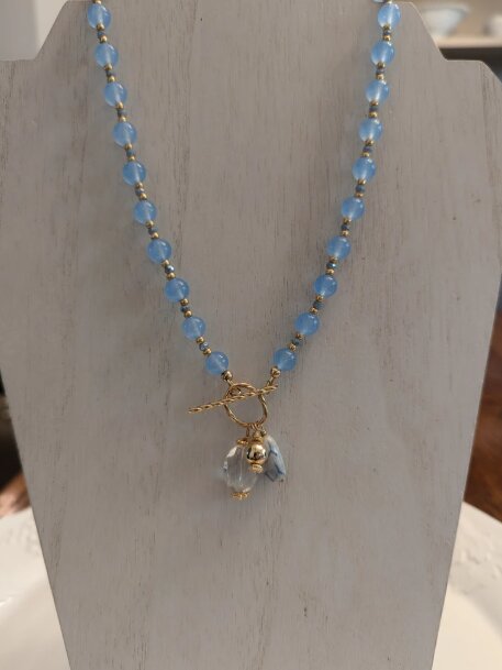 Beaded blue chalcedony necklace with a crystal pendant